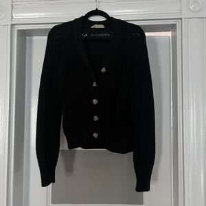 Thick-knit Everlane cardigan.
